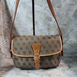 Dooney & Bourke monogram canvas and leather  bag. 